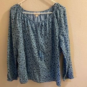 Woman’s cotton blouse, made in India.light blue with navy blue little flowers .